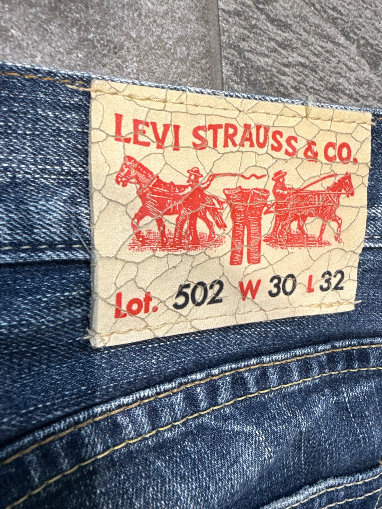 000’s Levi’s 502 Ghost Wash Jeans (30”)