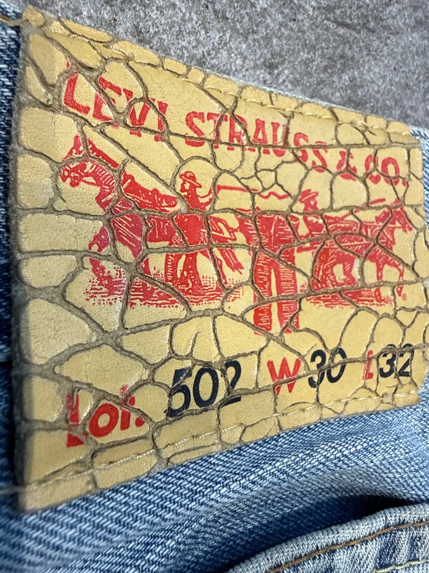 000’s Levi’s 502 Ghost Wash Jeans (30”)