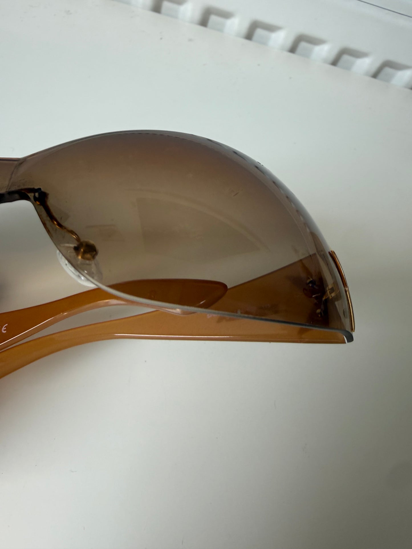 000’s Prada Gold Star Shield Sunglasses