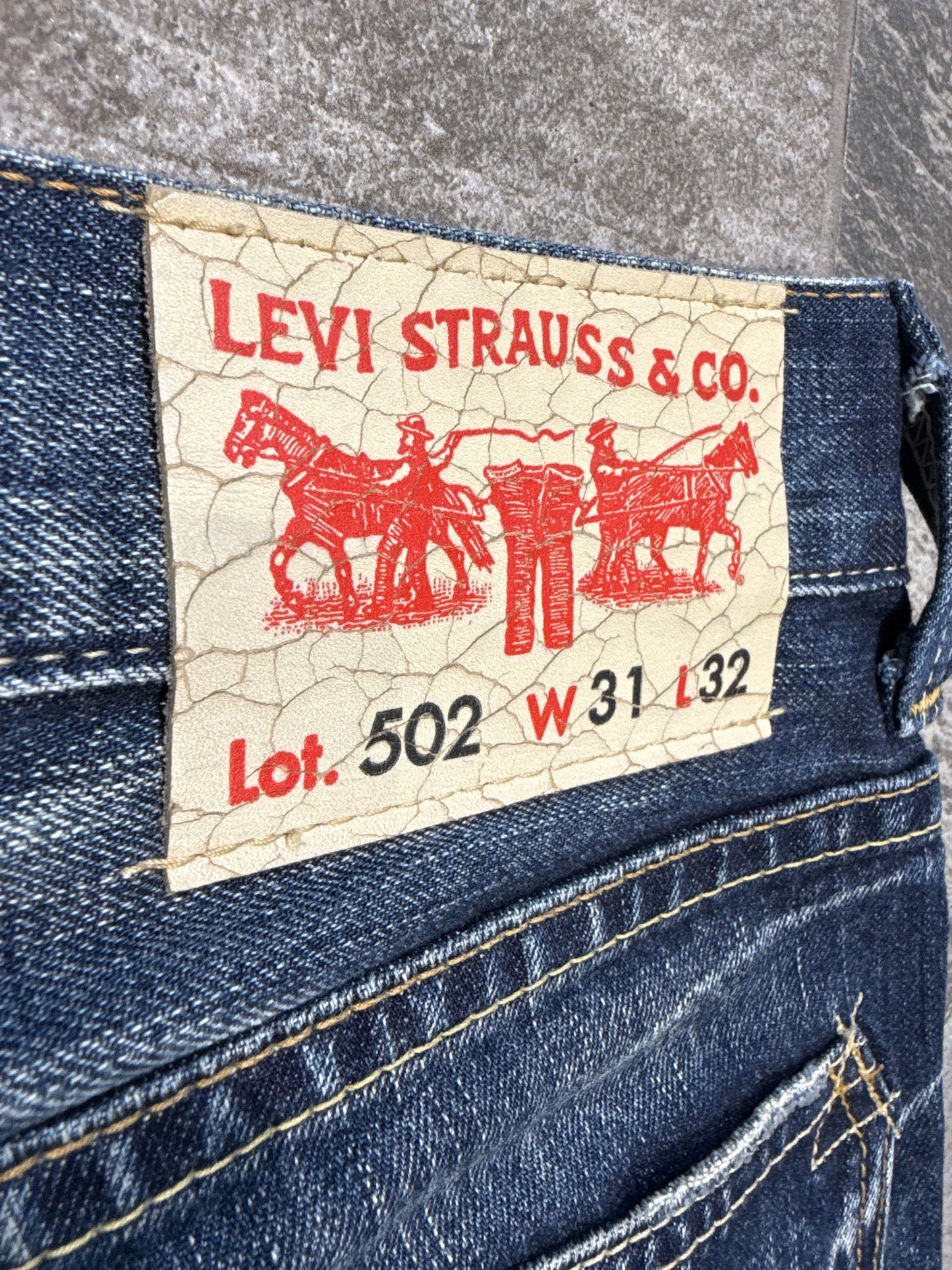 000’s Levi’s 502 Ghost Wash Jeans (30”)